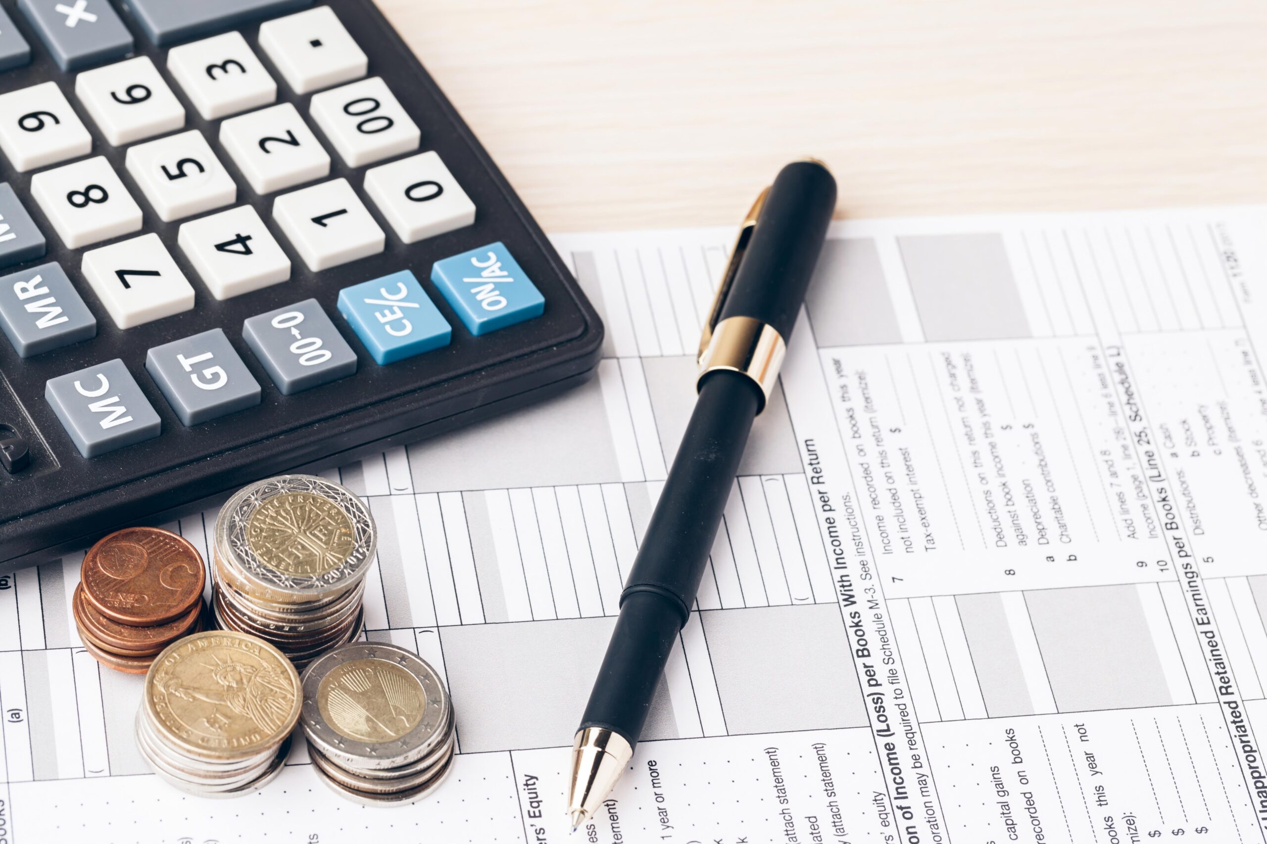 the-close-up-of-accounting-documents-with-money-co-2021-12-09-01-52-08-utc